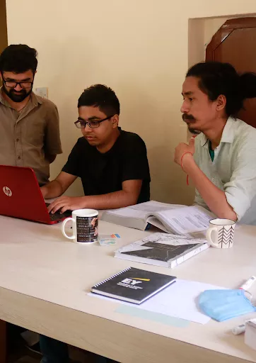 Employee working on laptop in office